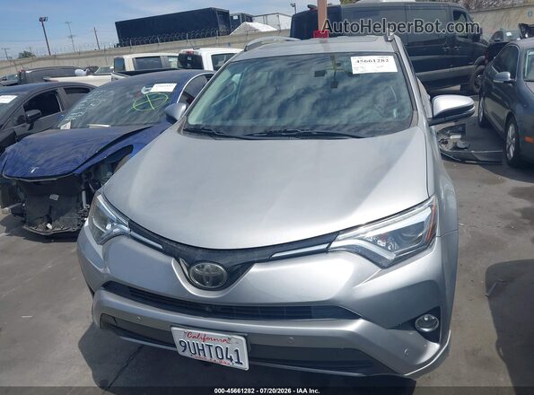 2T3YFREVXHW354545 2017 TOYOTA RAV4 Silver Widok wnętrza z tyłu