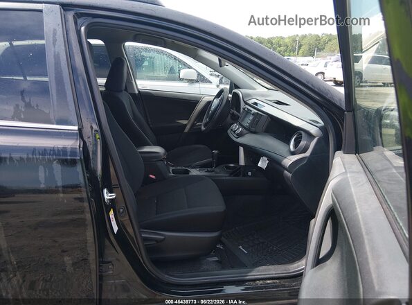 2T3ZFREV0GW299638 2016 TOYOTA RAV4 Черный Вид салона спереди