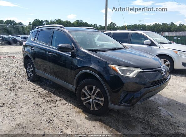 2T3ZFREV0GW299638 2016 TOYOTA RAV4 Черный Вид задней части салона