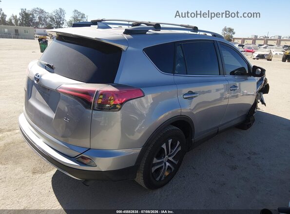 2T3ZFREV0HW326757 2017 TOYOTA RAV4 Silver Trasero derecho
