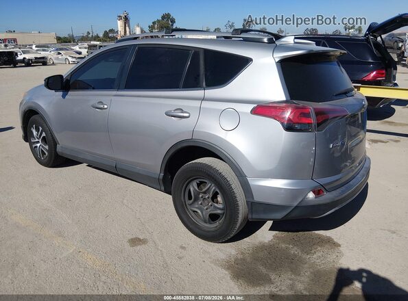 2T3ZFREV0HW326757 2017 TOYOTA RAV4 Silver Trasero izquierdo