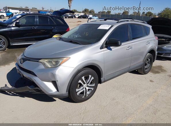 2T3ZFREV0HW326757 2017 TOYOTA RAV4 Silver Vista tres cuartos delantera izquierda