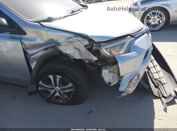 2T3ZFREV0HW326757 2017 TOYOTA RAV4 Silver Vista interior trasera
