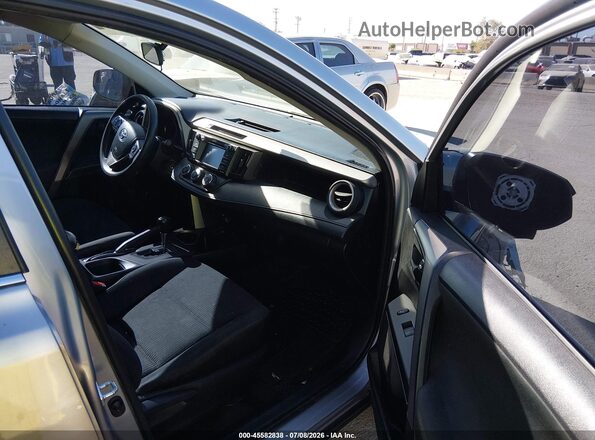 2T3ZFREV0HW326757 2017 TOYOTA RAV4 Silver Vista interior delantera