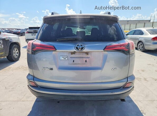 2T3ZFREV0HW343865 2017 TOYOTA RAV4 Silver Вид ззаду