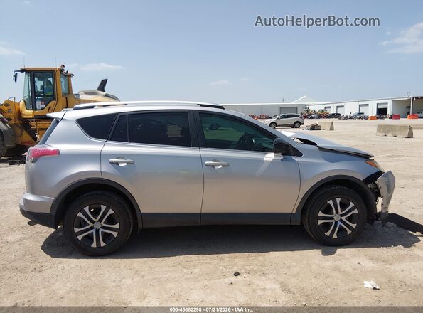 2T3ZFREV1GW241148 2016 TOYOTA RAV4 Silver Вид задньої частини салону