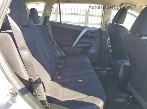 2T3ZFREV1GW261867 2016 TOYOTA RAV4 Silver Vista interior trasera