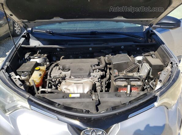 2T3ZFREV1GW261867 2016 TOYOTA RAV4 Silver Vista del compartimento del motor