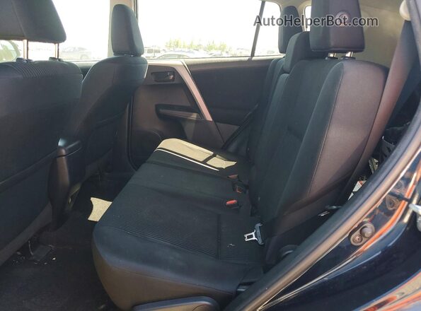 2T3ZFREV1HW331255 2017 TOYOTA RAV4 Blue Rear interior view