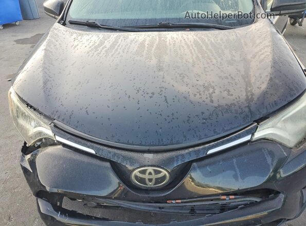 2T3ZFREV1HW337461 2017 TOYOTA RAV4 Black უკანა სალონის ხედი
