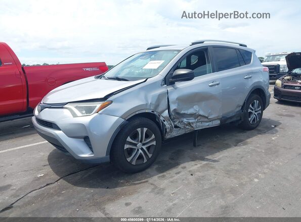 2T3ZFREV1HW348427 2017 TOYOTA RAV4 Silver Առջևի ձախ երեք քառորդ տեսարան