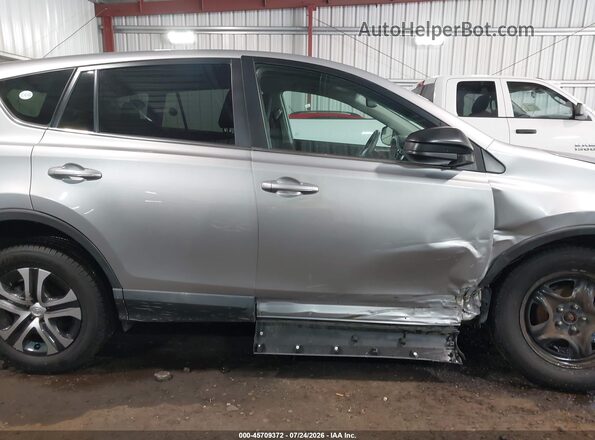2T3ZFREV1JW471926 2018 TOYOTA RAV4 Серый Вид задней части салона