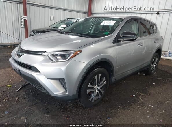 2T3ZFREV1JW471926 2018 TOYOTA RAV4 Серый Передняя левая четверть