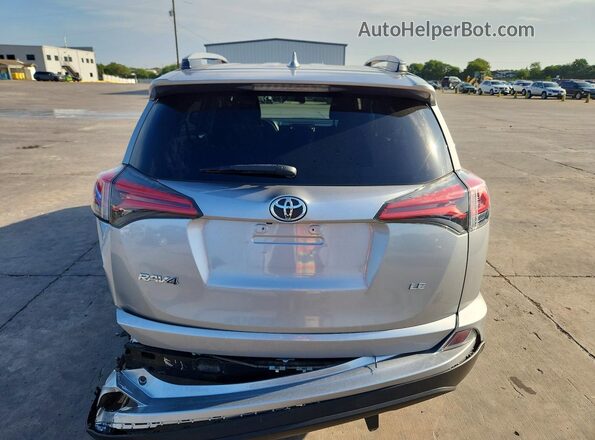 2T3ZFREV2HW332124 2017 TOYOTA RAV4 Silver Հետևի տեսք