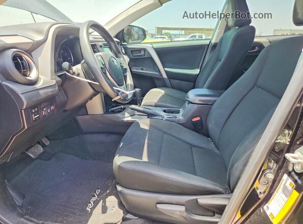 2T3ZFREV2JW433234 2018 TOYOTA RAV4 Black Front interior view
