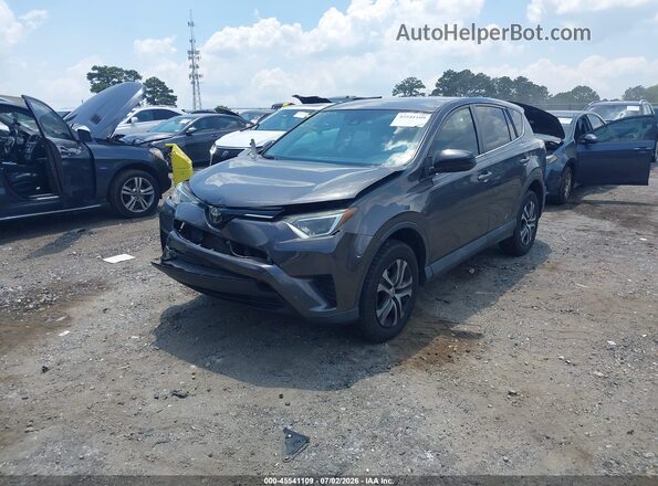 2T3ZFREV2JW439101 2018 TOYOTA RAV4 Gray Front left