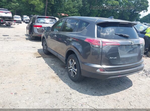 2T3ZFREV2JW439101 2018 TOYOTA RAV4 Gray Rear left
