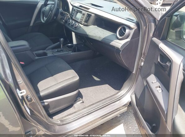 2T3ZFREV2JW439101 2018 TOYOTA RAV4 Gray Front interior view