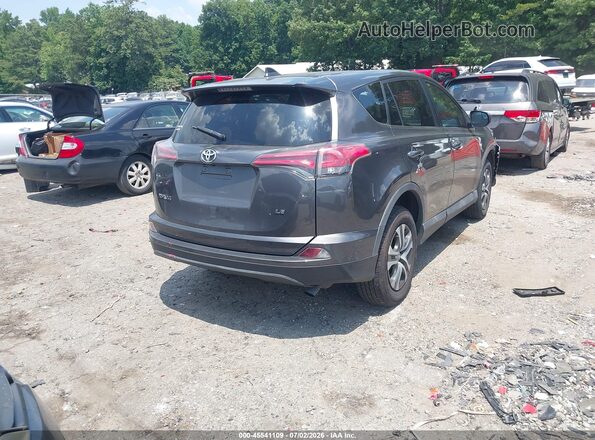 2T3ZFREV2JW439101 2018 TOYOTA RAV4 Gray Rear right