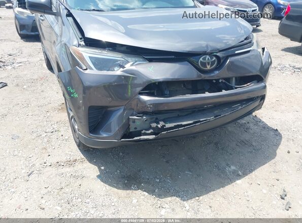 2T3ZFREV2JW439101 2018 TOYOTA RAV4 Gray Front view