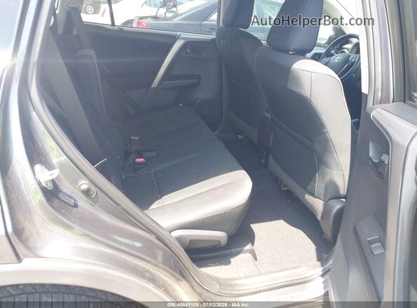2T3ZFREV2JW439101 2018 TOYOTA RAV4 Gray VIN sticker view