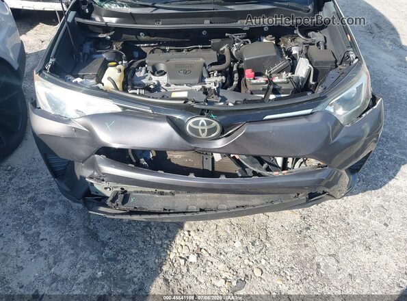 2T3ZFREV2JW439101 2018 TOYOTA RAV4 Gray Rear view