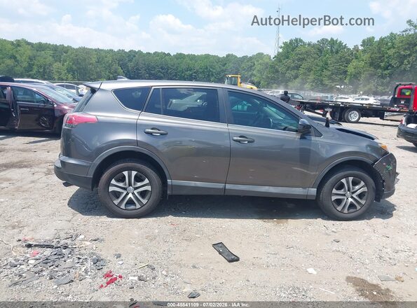 2T3ZFREV2JW439101 2018 TOYOTA RAV4 Gray Rear interior view