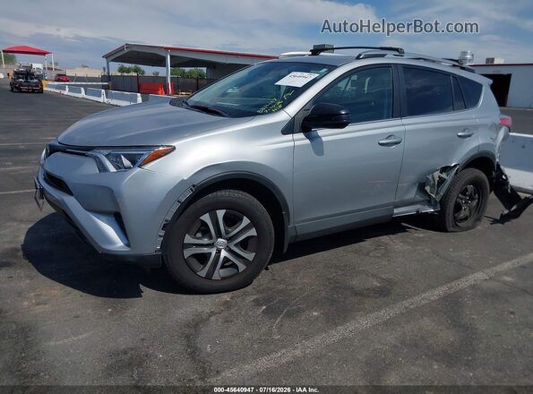 2T3ZFREV2JW455363 2018 TOYOTA RAV4 Silver Вид спереду