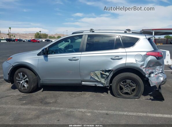 2T3ZFREV2JW455363 2018 TOYOTA RAV4 Silver 