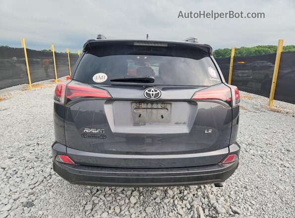 2T3ZFREV2JW509101 2018 TOYOTA RAV4 Gray Вид ззаду