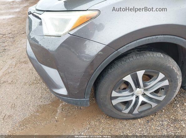 2T3ZFREV3GW235707 2016 TOYOTA RAV4 Gray Widok z przodu