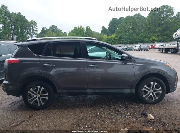 2T3ZFREV3GW235707 2016 TOYOTA RAV4 Gray Widok wnętrza z tyłu