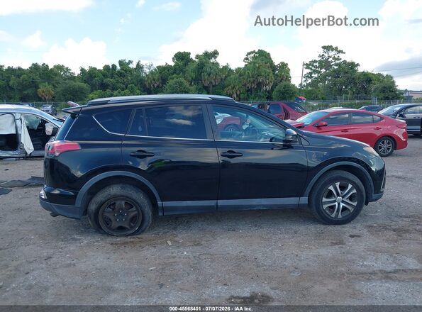 2T3ZFREV3JW494754 2018 TOYOTA RAV4 Black Widok wnętrza z tyłu