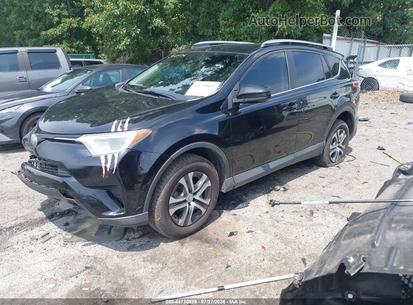 2T3ZFREV3JW512850 2018 TOYOTA RAV4 Black Vista tres cuartos delantera izquierda