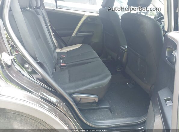 2T3ZFREV3JW512850 2018 TOYOTA RAV4 Black Vista de la etiqueta del VIN