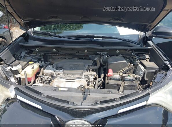 2T3ZFREV3JW512850 2018 TOYOTA RAV4 Black Vista trasera
