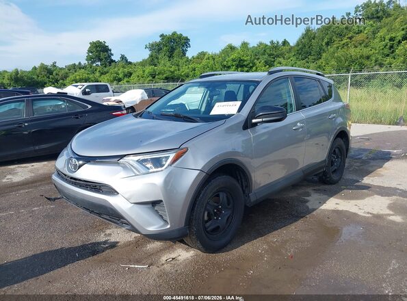 2T3ZFREV4GW304114 2016 TOYOTA RAV4 Серебряный Передняя левая четверть