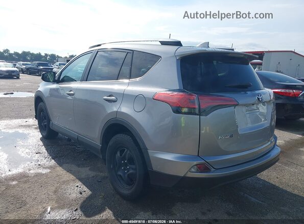 2T3ZFREV4GW304114 2016 TOYOTA RAV4 Серебряный Задняя левая четверть