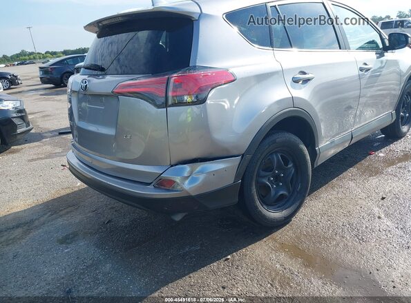 2T3ZFREV4GW304114 2016 TOYOTA RAV4 Серебряный Вид спереди