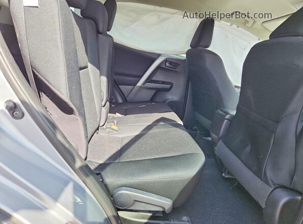 2T3ZFREV4HW353105 2017 TOYOTA RAV4 Серебряный Вид задней части салона