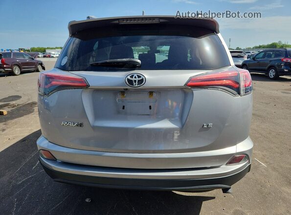 2T3ZFREV4HW353105 2017 TOYOTA RAV4 Серебряный Вид сзади