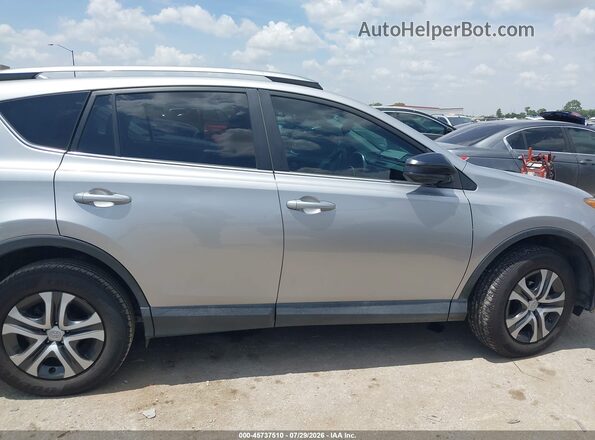 2T3ZFREV4JW456434 2018 TOYOTA RAV4 Gray Вид задньої частини салону