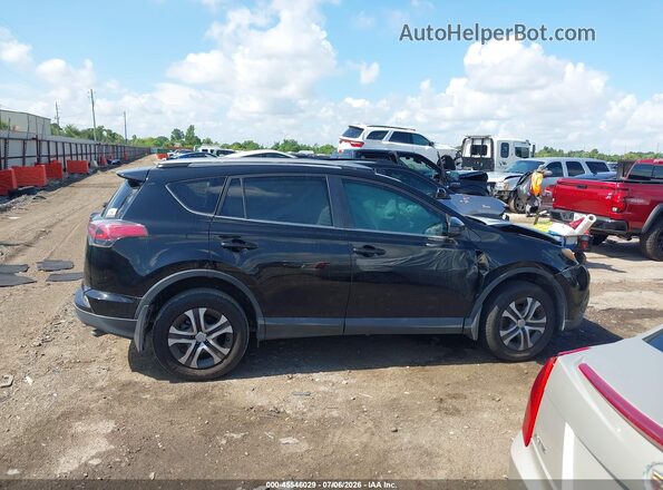2T3ZFREV4JW465800 2018 TOYOTA RAV4 Black უკანა სალონის ხედი