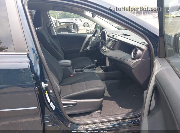 2T3ZFREV4JW506443 2018 TOYOTA RAV4 Black წინა სალონის ხედი