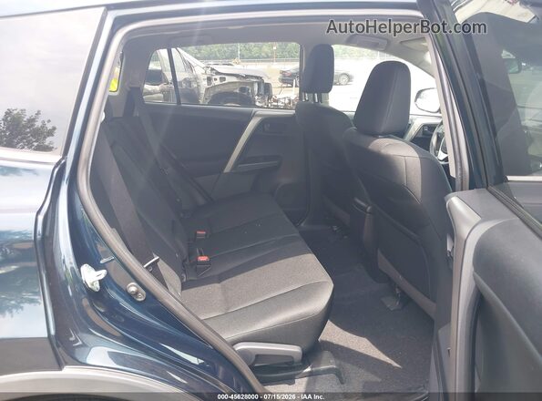 2T3ZFREV4JW506443 2018 TOYOTA RAV4 Black VIN კოდის სტიკერის ხედი