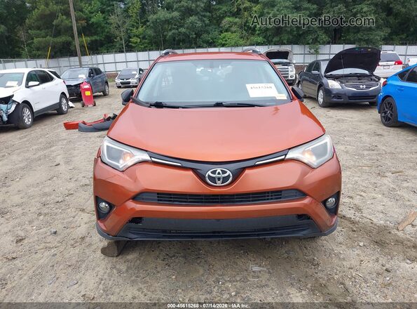2T3ZFREV5GW251567 2016 TOYOTA RAV4 Orange Սալոնի հետևի տեսք