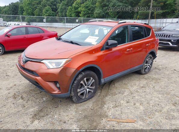 2T3ZFREV5GW251567 2016 TOYOTA RAV4 Orange Առջևի ձախ երեք քառորդ տեսարան