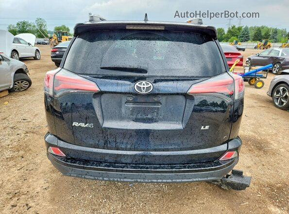 2T3ZFREV5GW308396 2016 TOYOTA RAV4 Black Vista trasera
