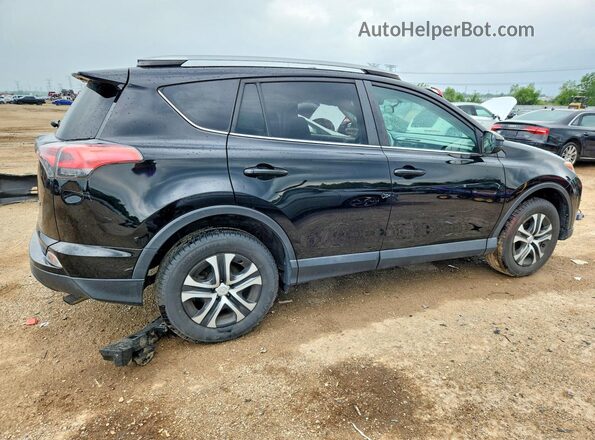 2T3ZFREV5GW308396 2016 TOYOTA RAV4 Black Trasero derecho