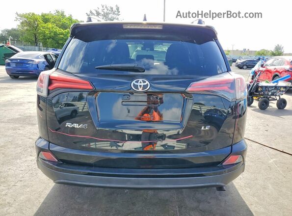 2T3ZFREV5HW321120 2017 TOYOTA RAV4 Black Вид ззаду